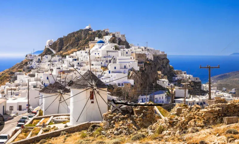Windmills below the white hilltop village of Chora on Serifos