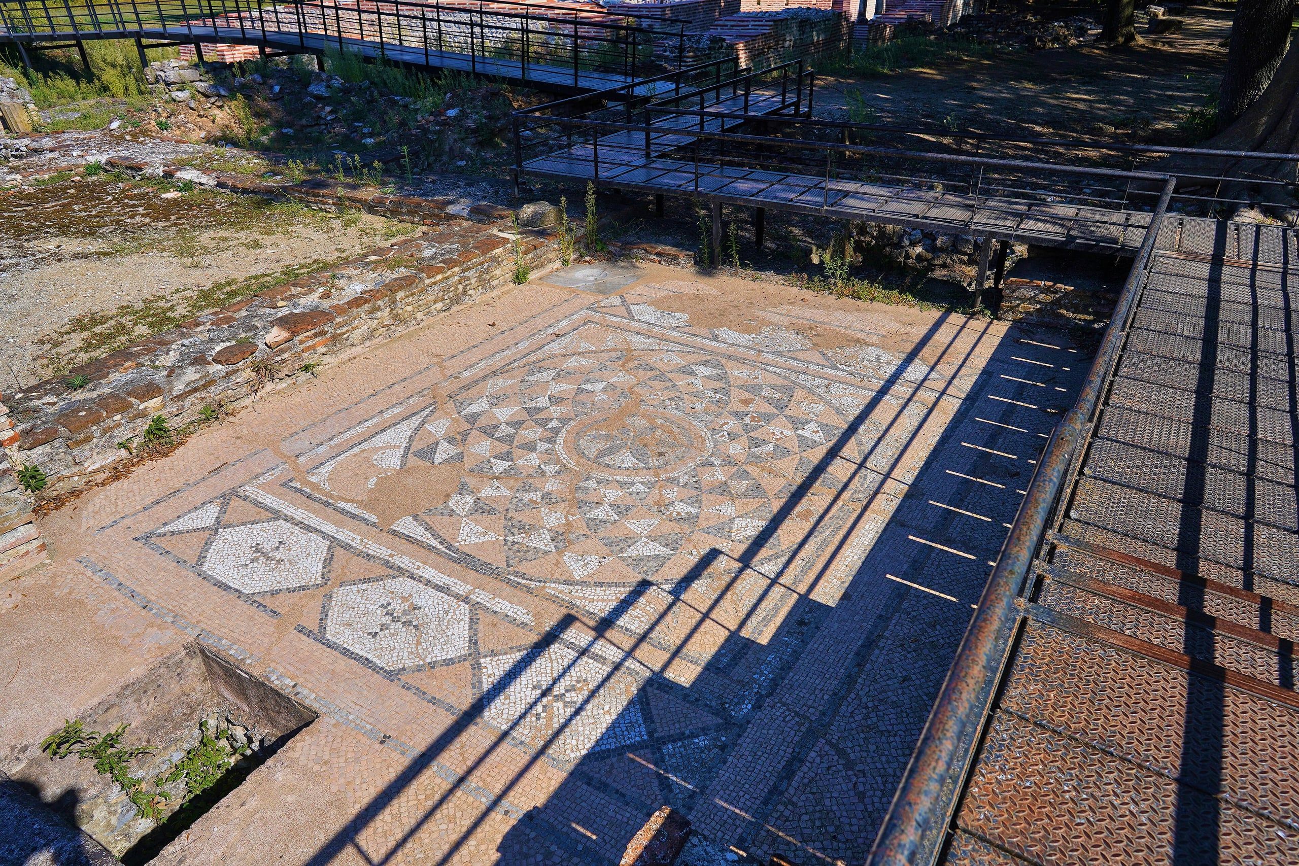 Visitor walkway above a large mosaic floor at the archaeological site of Dion