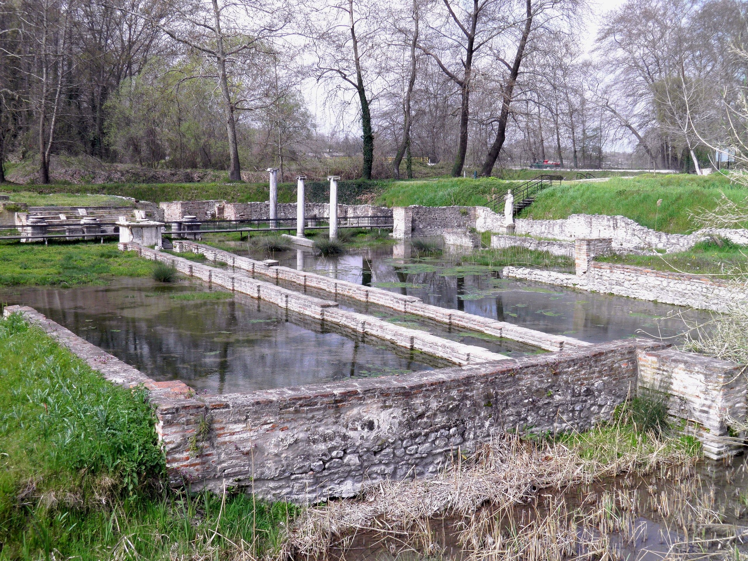 Pools and columns of the Sanctuary of Isis at ancient Dion among plane trees