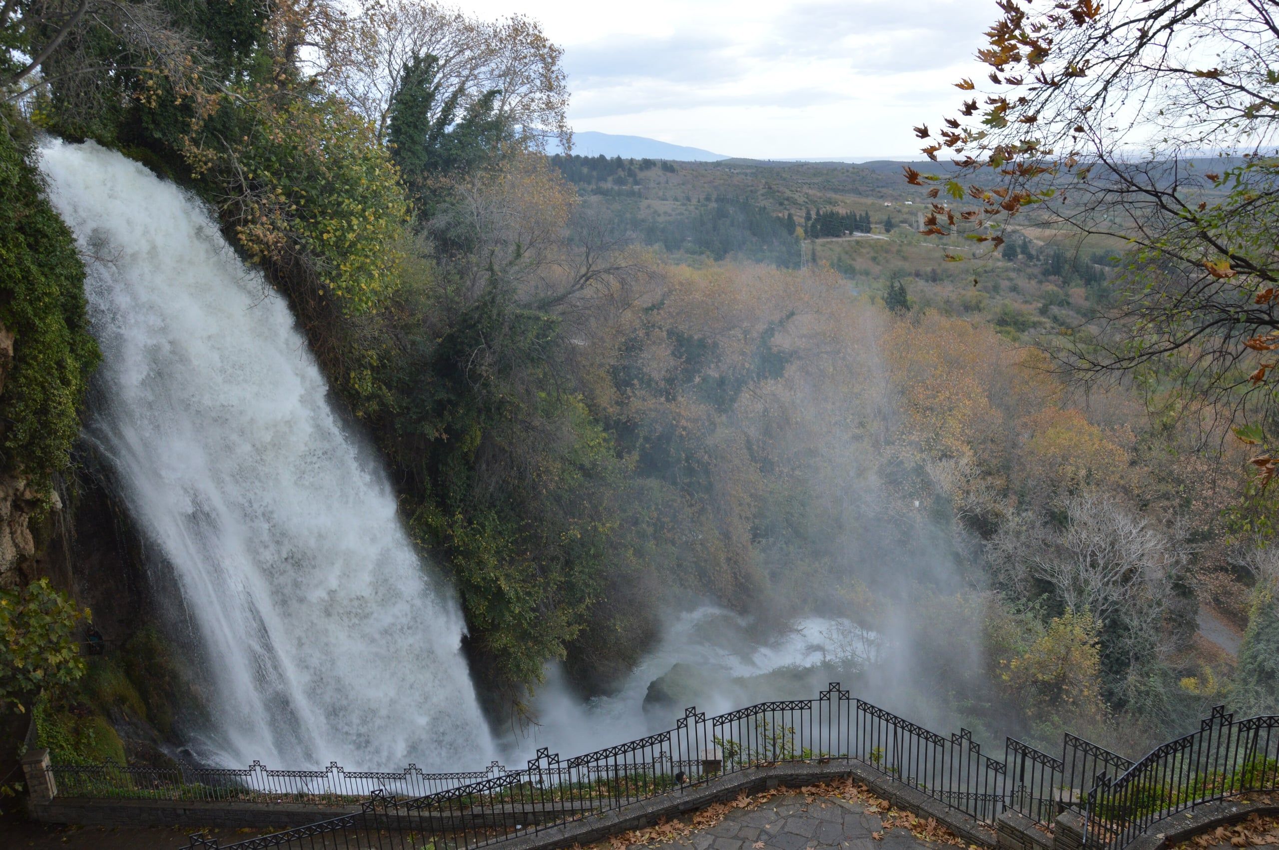 Edessa waterfall and viewing path, with the wide valley and plain beyond