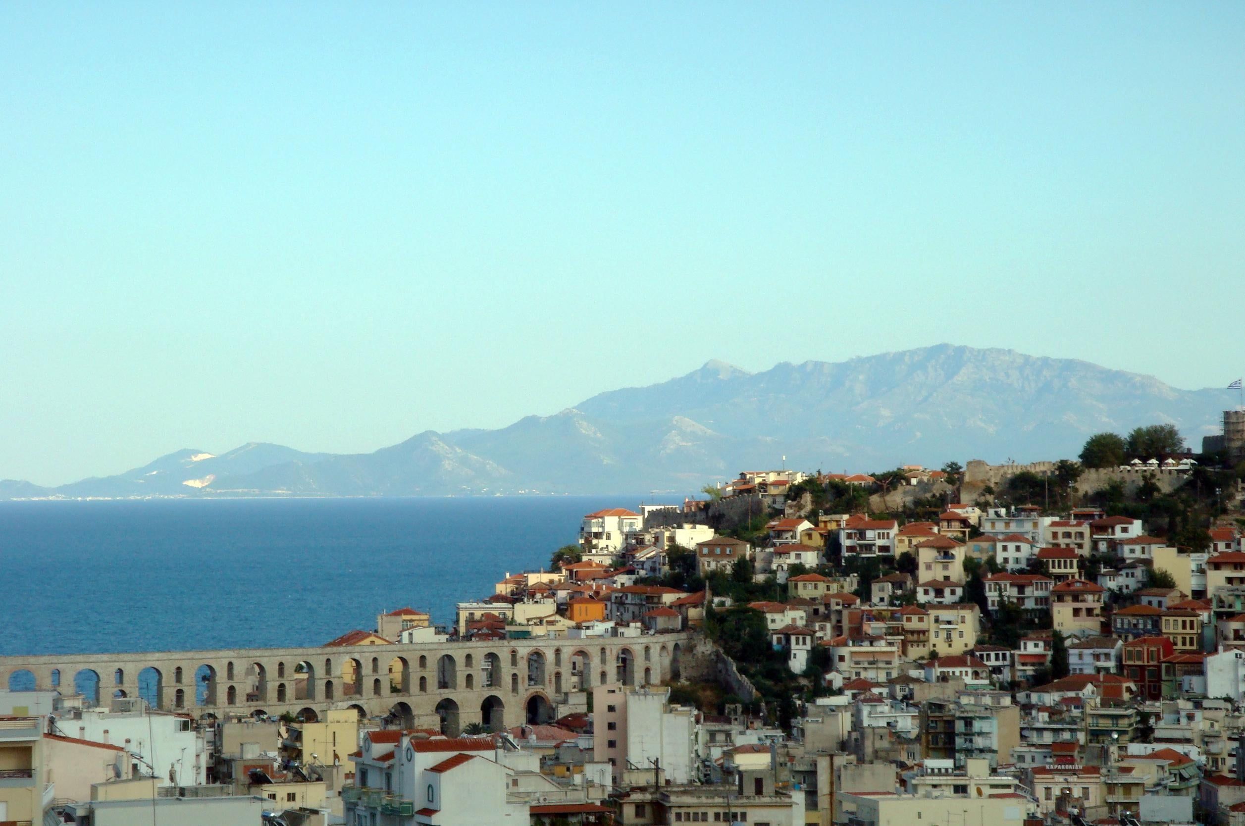 The Kamares aqueduct of Kavala with the town, the sea and mountains behind
