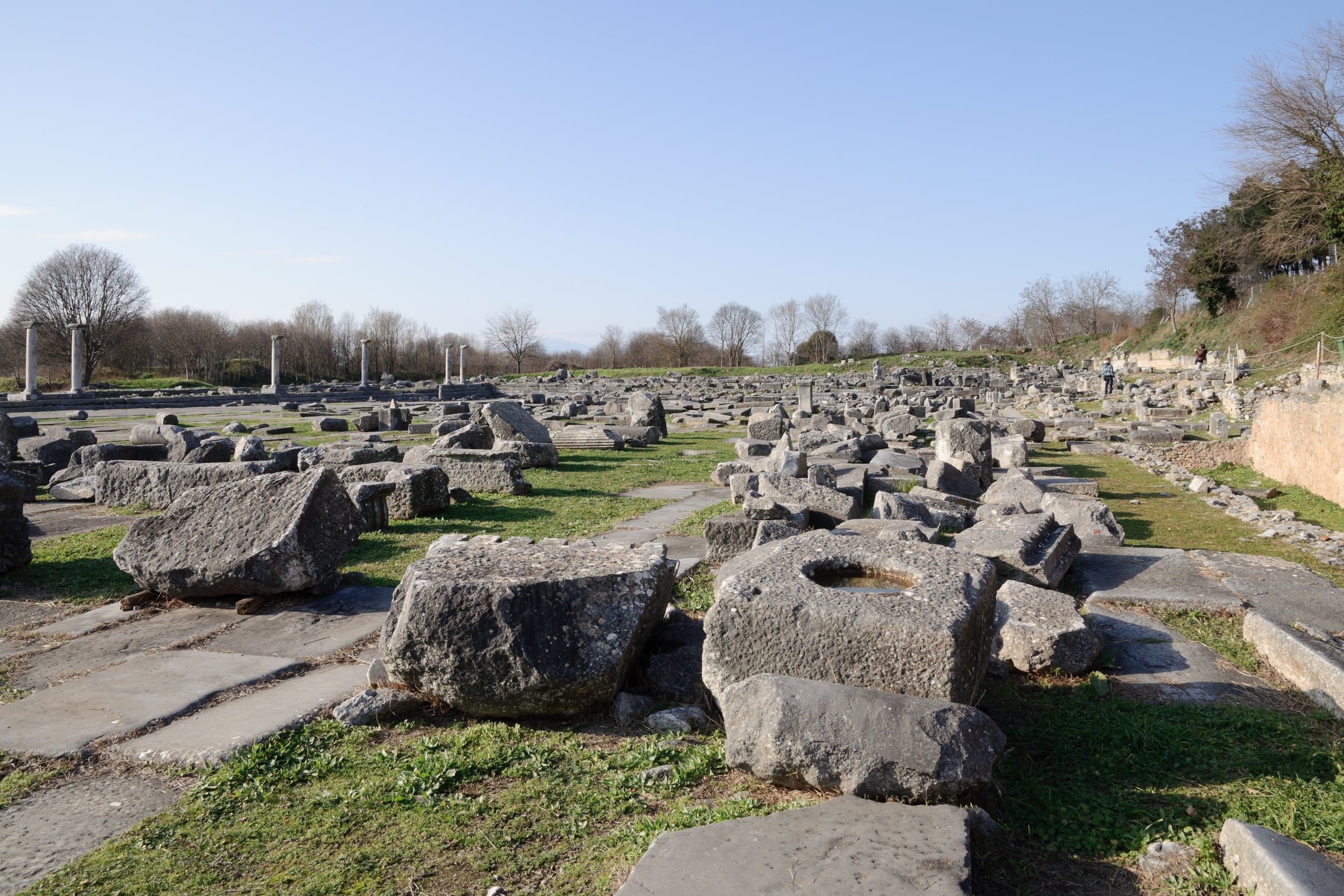 Fallen column drums and stone blocks across the ancient site of Philippi