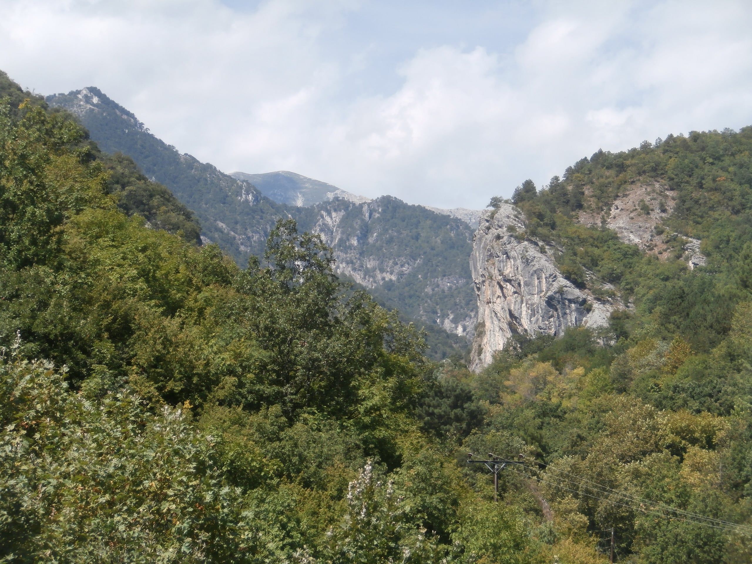 Forested gorge and limestone cliffs of the mountains above the Pozar baths